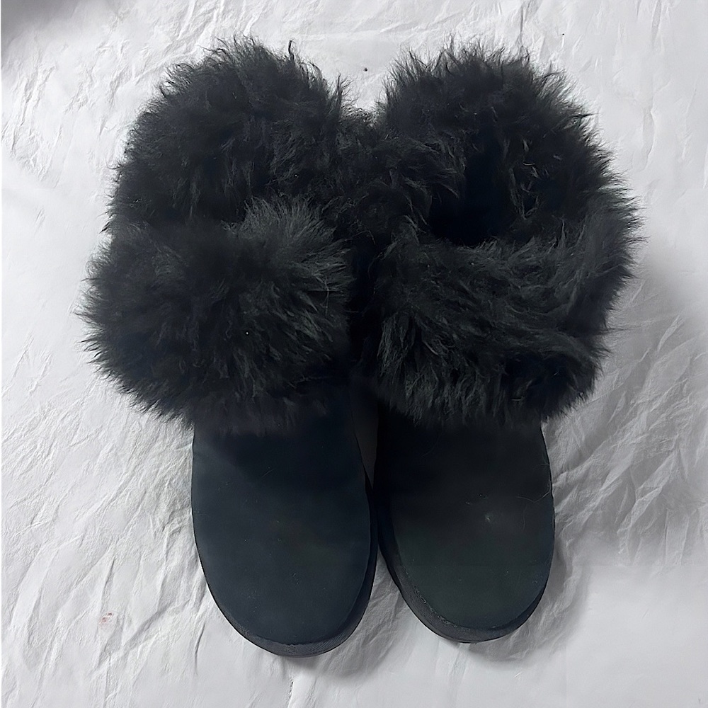 Black fluffy UGG boots